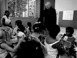 Archbishop Hanna with children