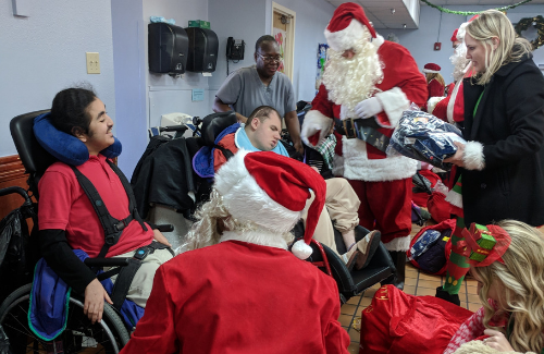 Happy Santas at Padua House 2018